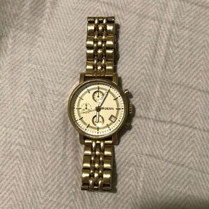 Gold fossil watch